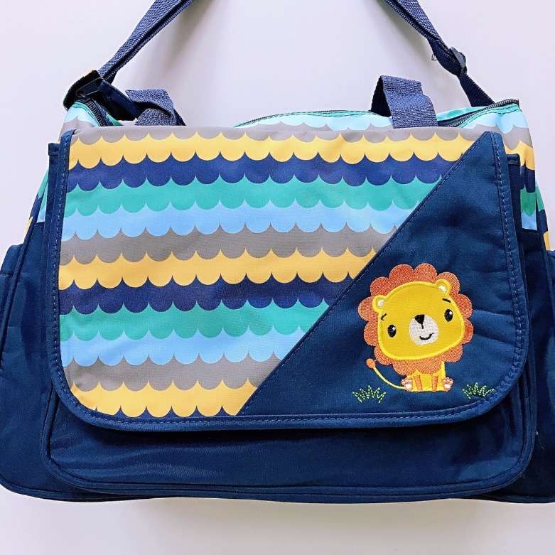 bolso maternal león azul